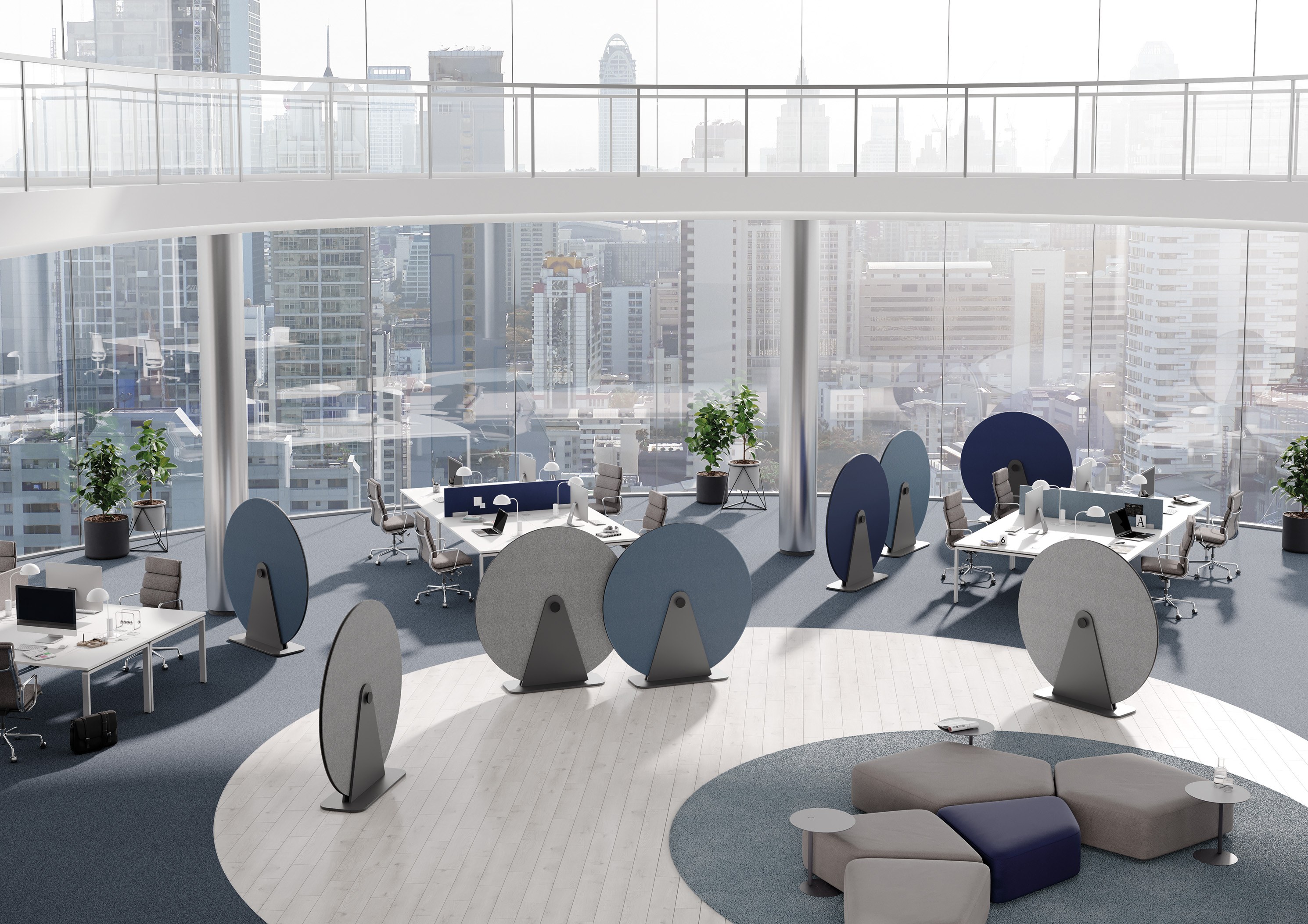 Großraumbüro mit Palmberg Terio Plus Disc Akustik-Absorbern in Grau und Blau zur Schallreduzierung und Verbesserung der Raumakustik.