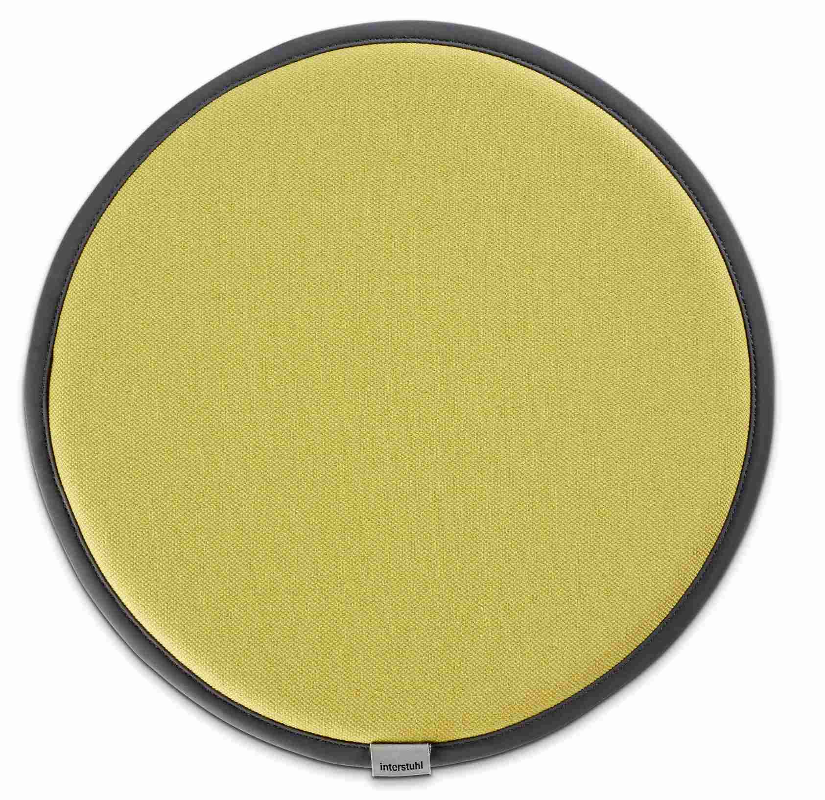 Gelbes Sitzkissen für Interstuhl Up Hocker, rund mit dunklem Rand, bequeme Sitzgelegenheit.