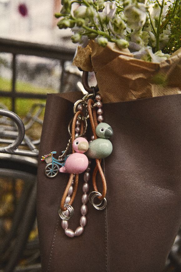 Vogel Rosa Schlüsselanhänger silberfarbenes Metall mit Naturleder Kay Bojesen