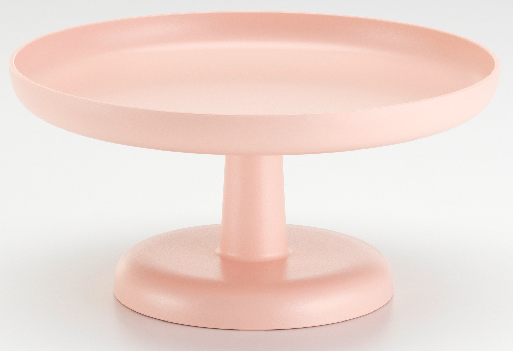 Vitra High Tray, ein zartrosa Serviertablett mit Fuß, ideal für Küche und Tischdekoration.