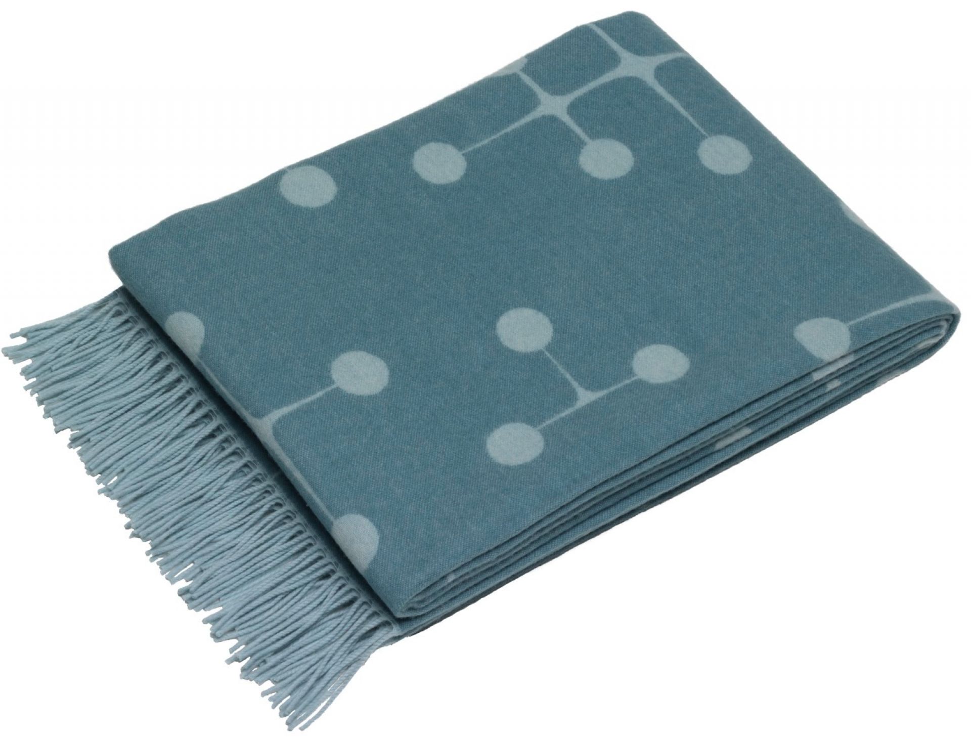 Hellblaue Eames Wolldecke von Vitra mit Fransen und Punktmuster, gefaltet dargestellt.