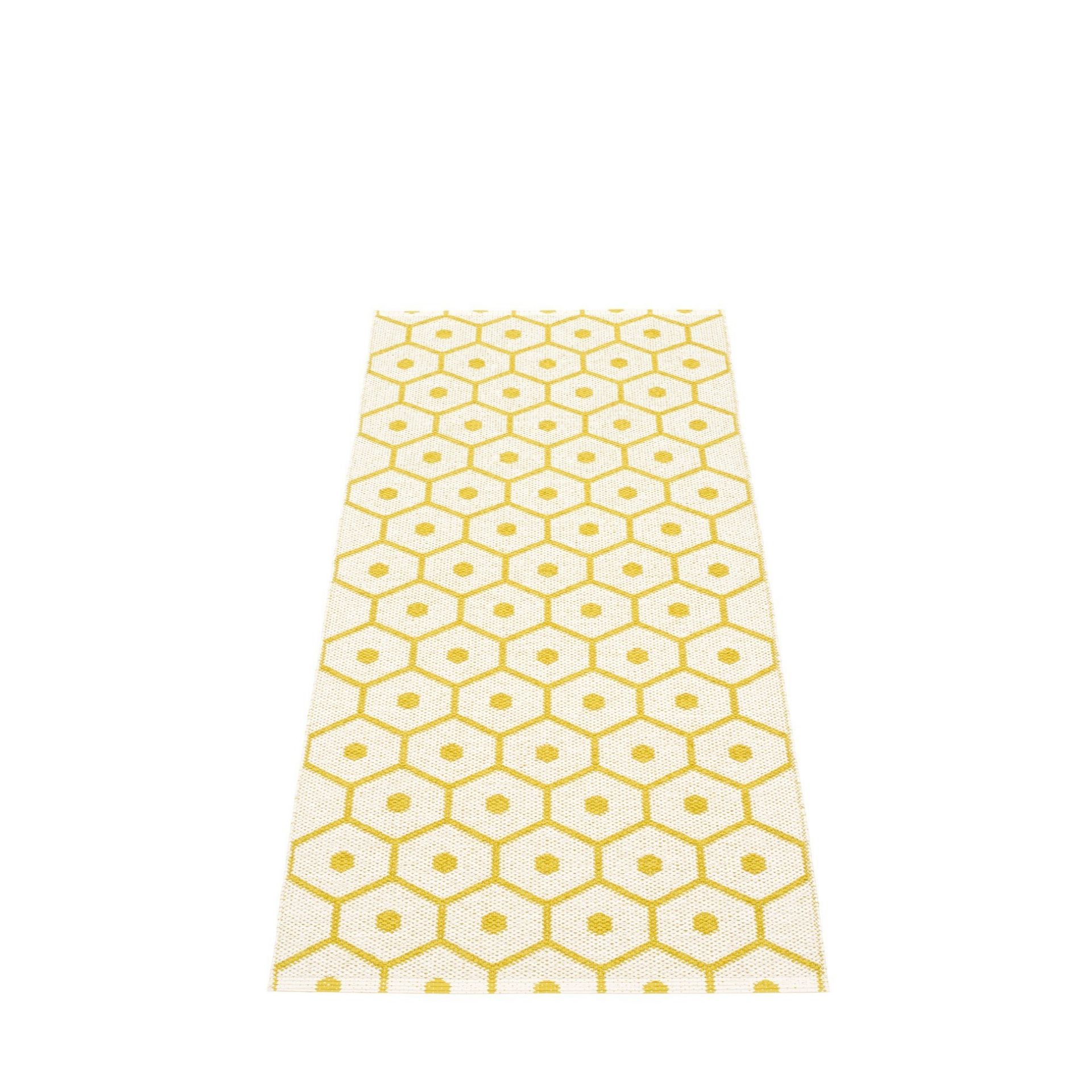 Honey Kunststoffteppich in Senf-Vanille mit geometrischem Muster, ideal als Küchenteppich oder Badteppich.