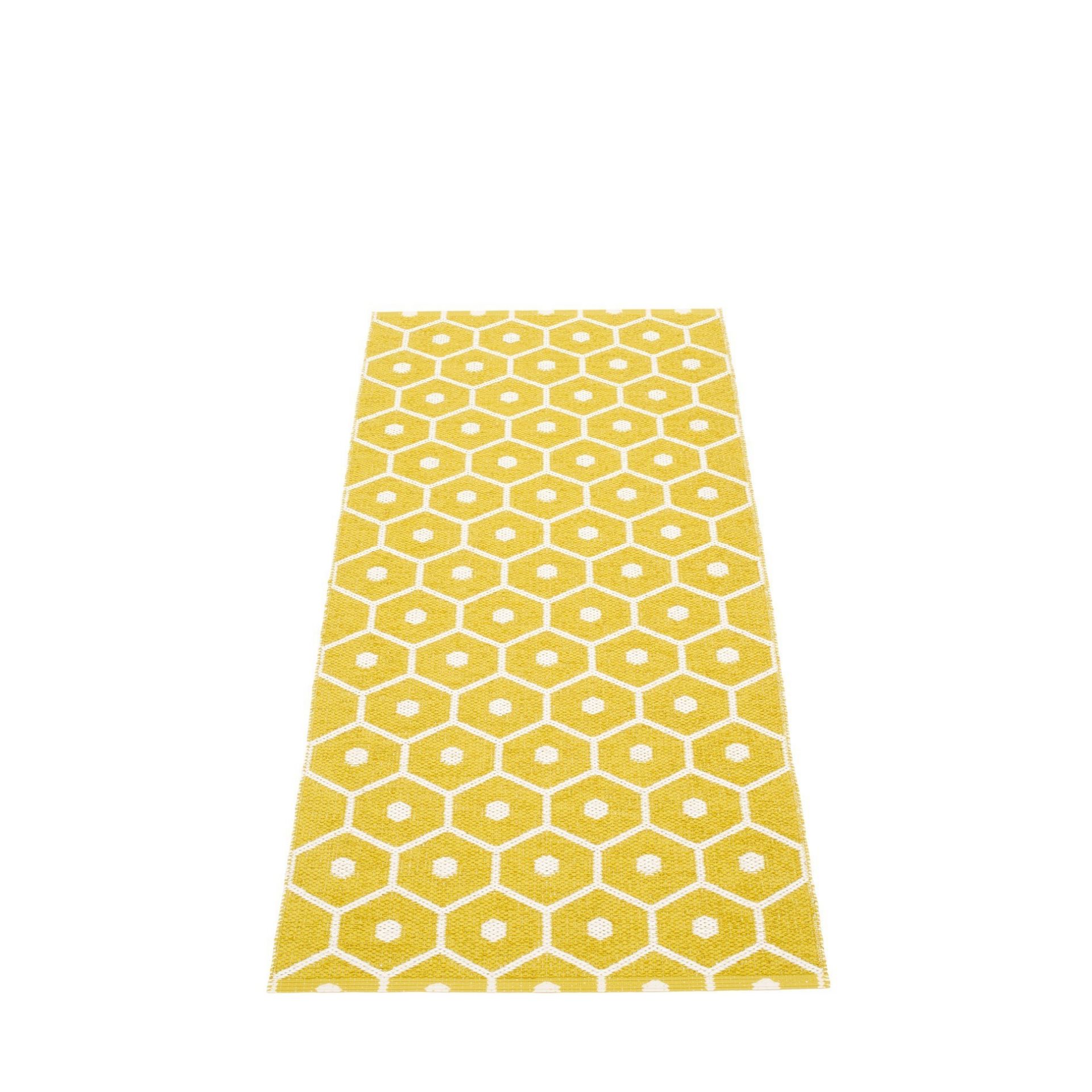 Honey Kunststoffteppich in Senf-Vanille mit geometrischem Wabenmuster, ideal als Küchenteppich oder Badteppich.