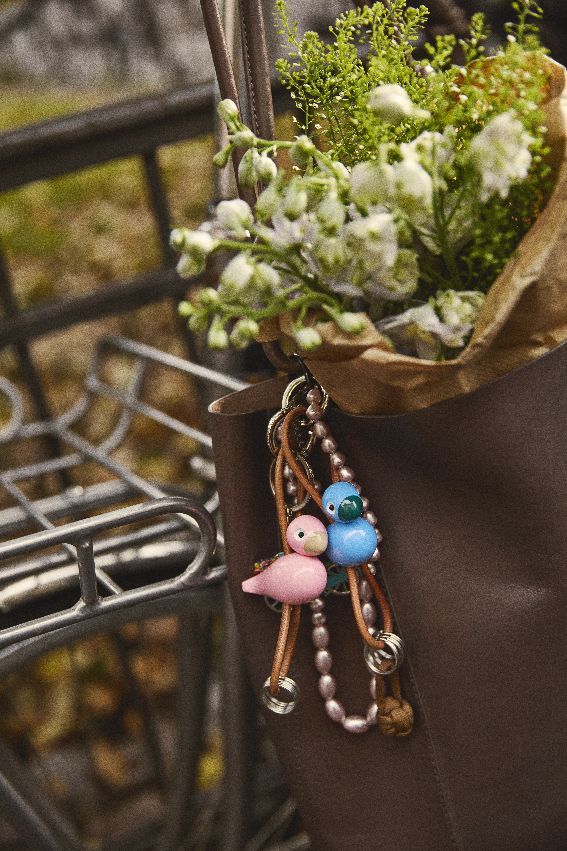 Vogel Rosa Schlüsselanhänger silberfarbenes Metall mit Naturleder Kay Bojesen