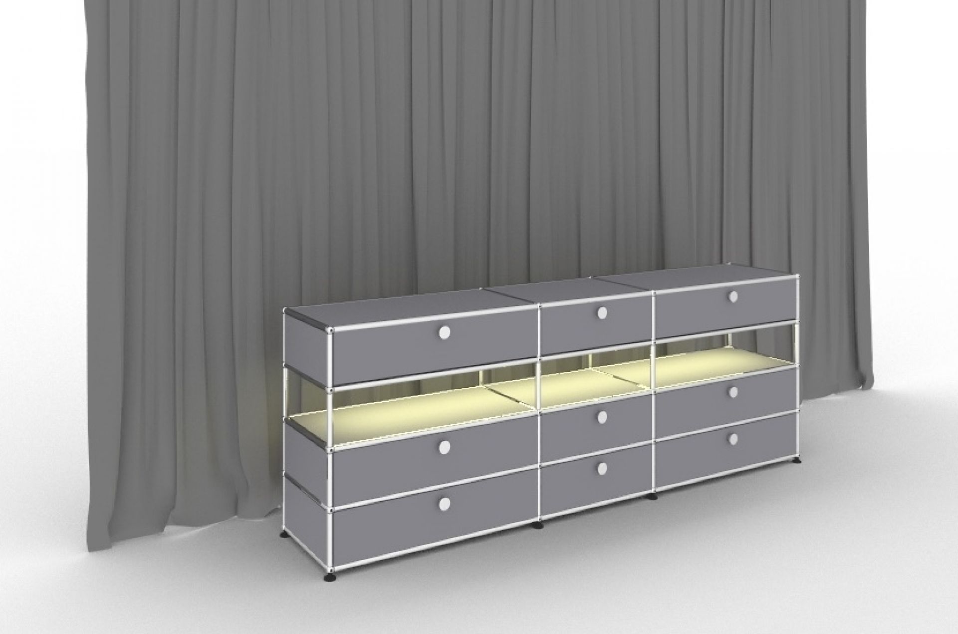 Graues USM Haller Sideboard mit Beleuchtung und neun Schubladen vor grauem Vorhang.