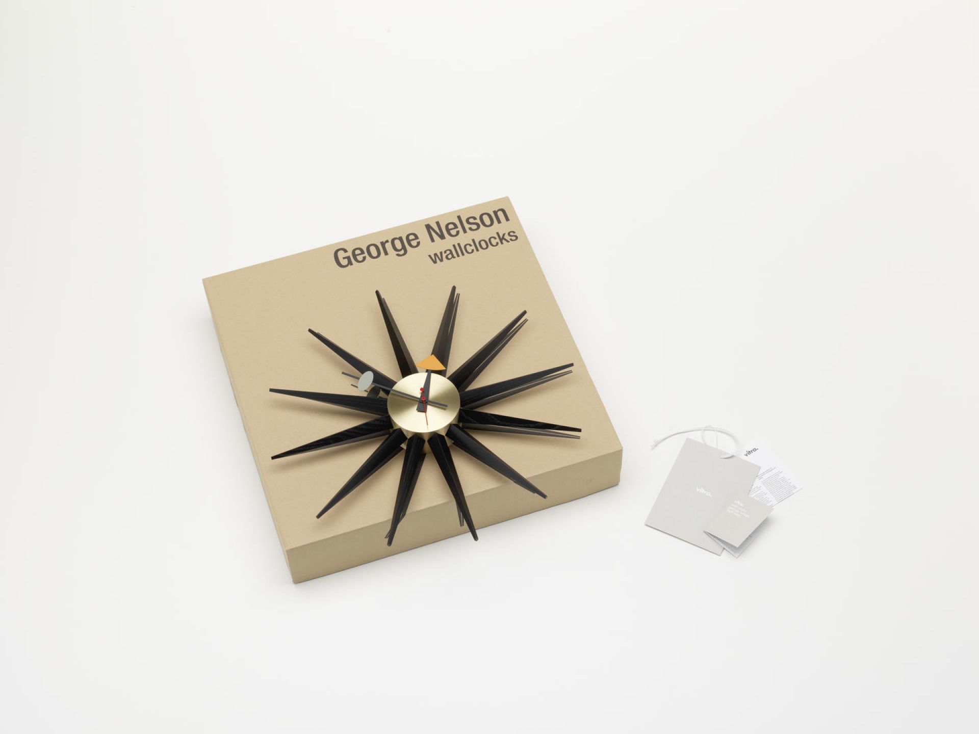 Sunburst Clock Uhr - schwarz / messing Wanduhr Vitra