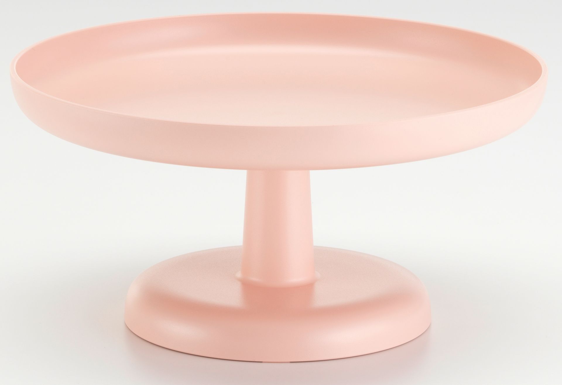 Vitra High Tray, ein zartrosa Serviertablett mit Fuß, ideal für Küche und Tischdekoration.